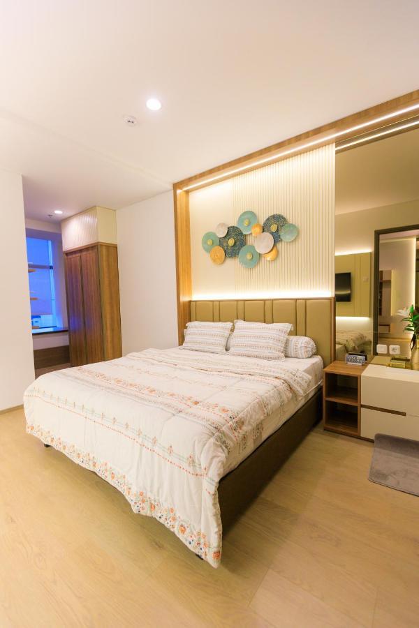 Calma 31 Apartment Makassar Bagian luar foto