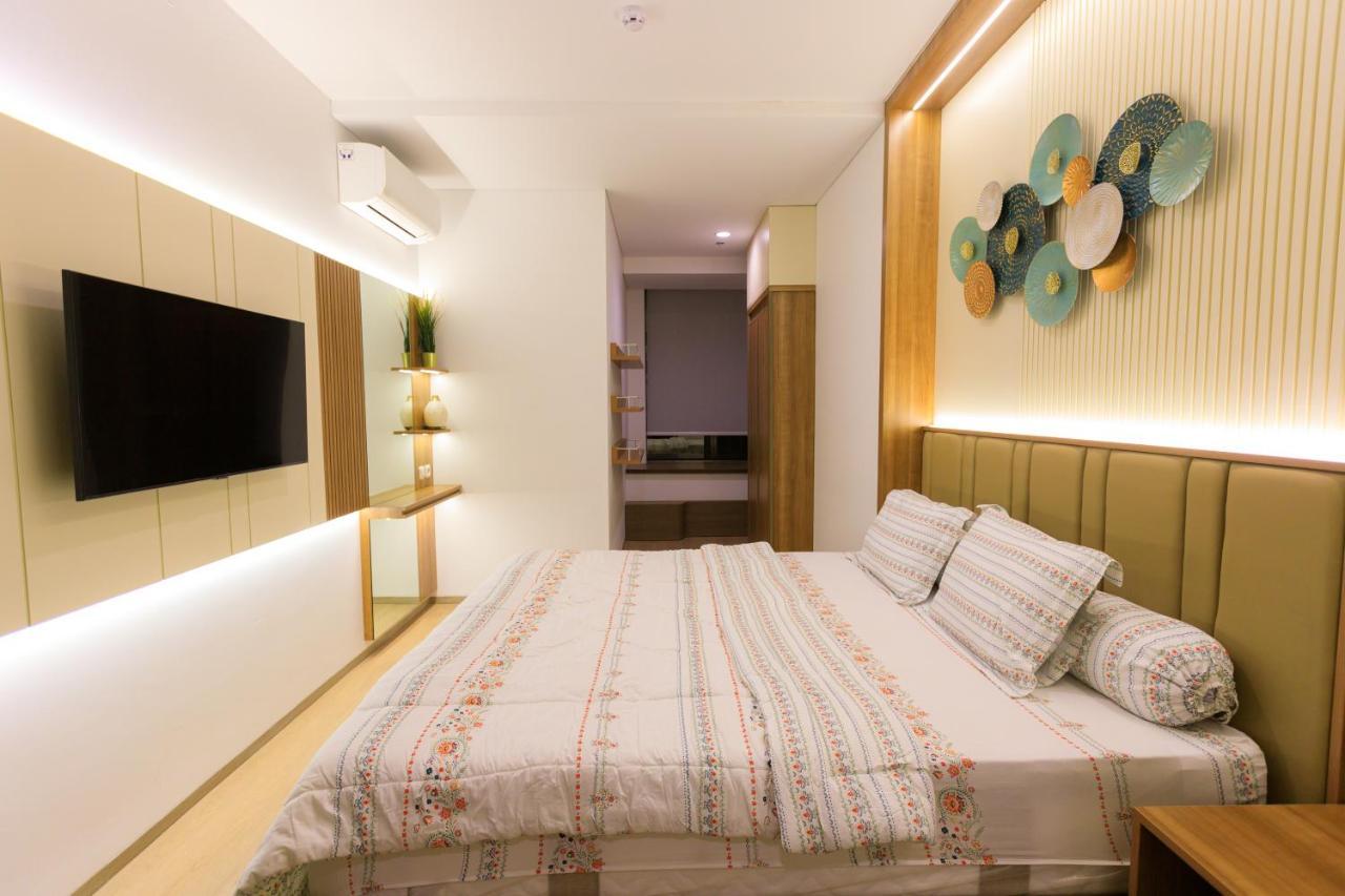 Calma 31 Apartment Makassar Bagian luar foto